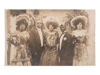 [AFRICAN AMERICANA]--[ENTERTAINMENT]. Real photo postcard of identified Vaudevillle entertainers, incl. interracial couple Sherman and Lulu Coates. 28 July 1906.
