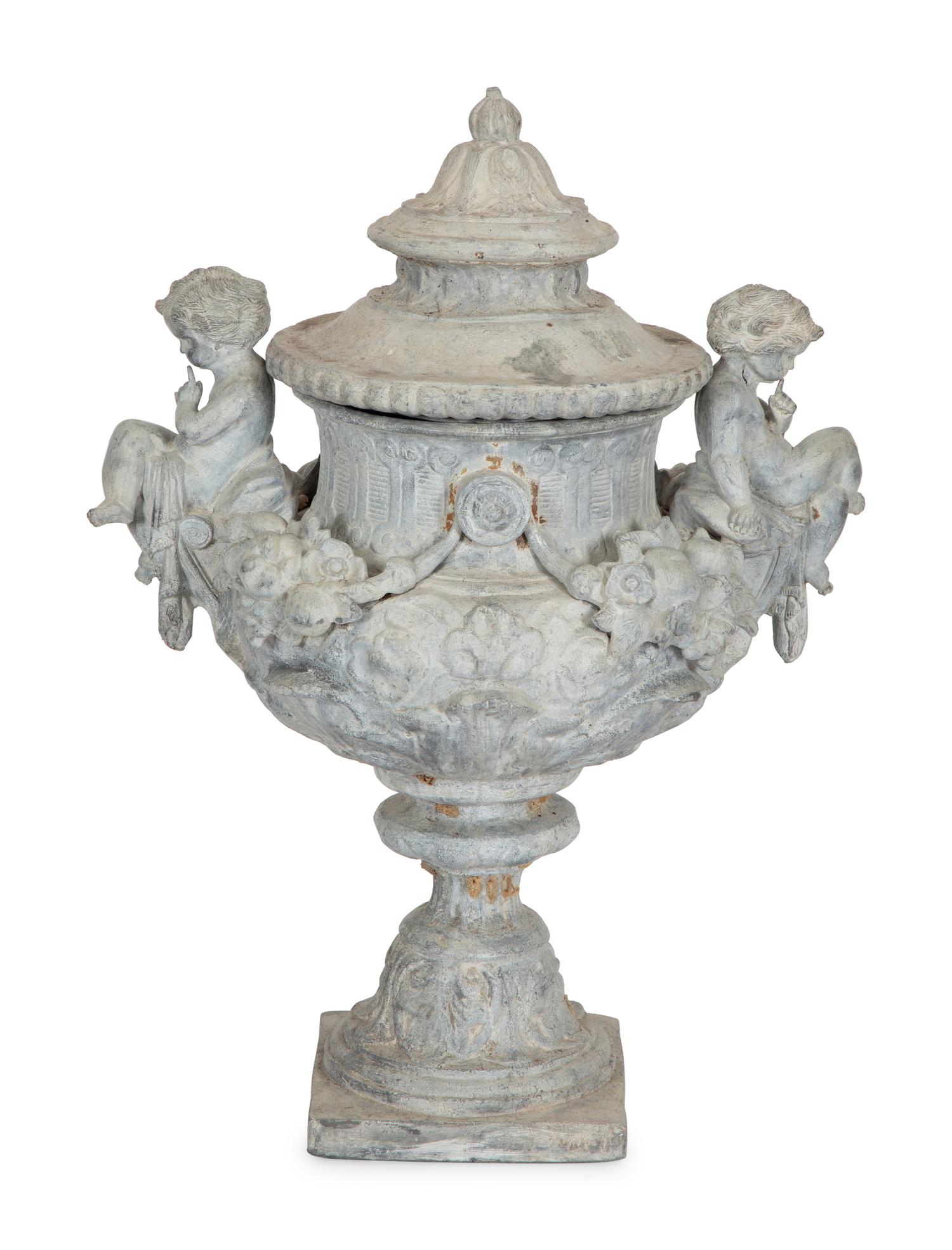 A Pair of Classical Style Cast Stone Covered Urns