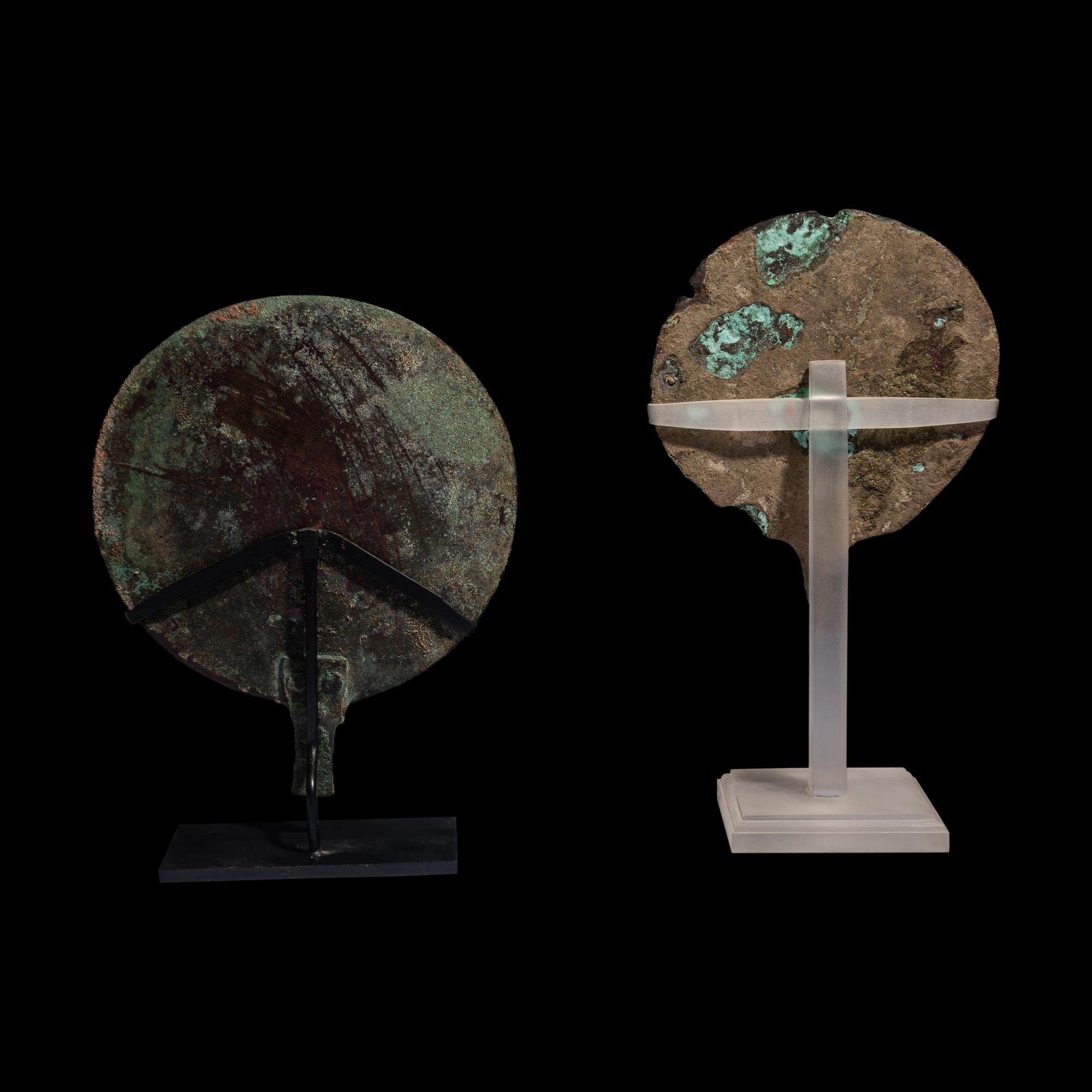 Two Roman Bronze Hand Mirrors