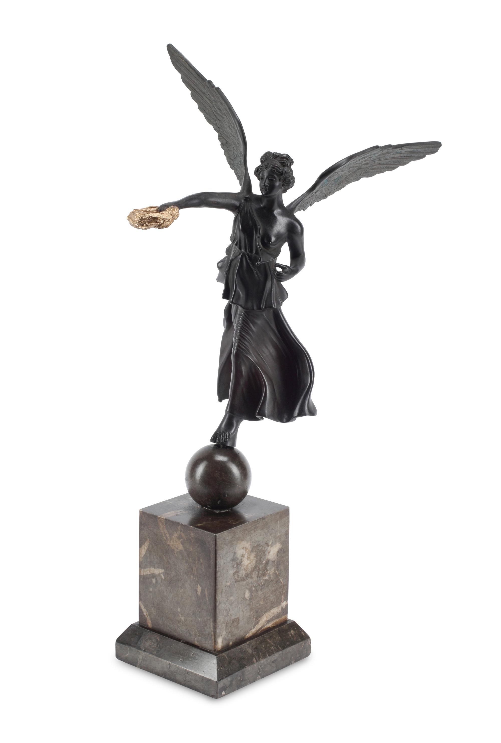 A Patinated and Parcel Gilt Bronze Figure of Winged Liberty