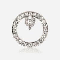 A diamond and platinum brooch