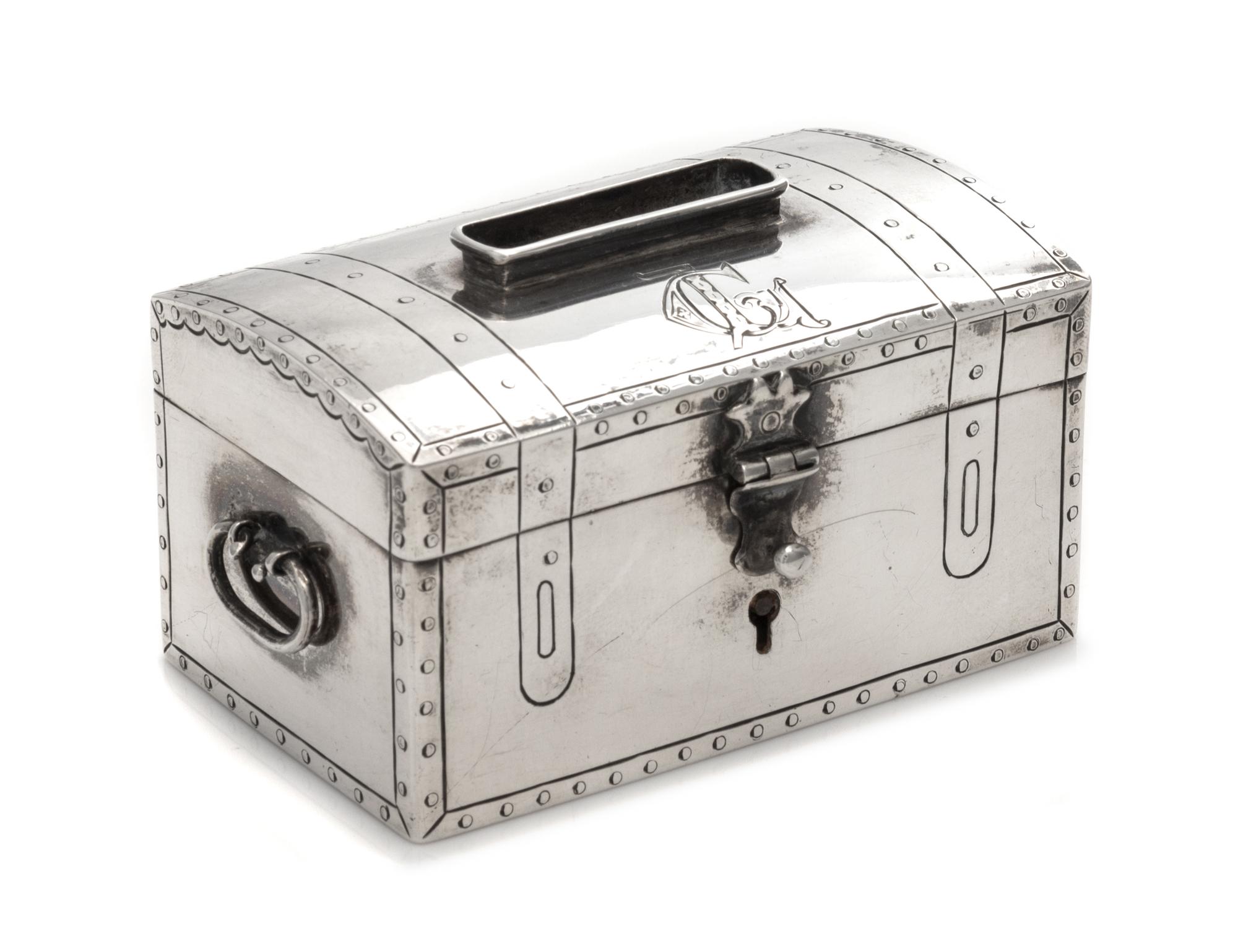 An Austrian Silver Tzedakah Box, Maker's Mark M-K, Vienna, 1858, in the form of a strong box, the lid with a coin slot.