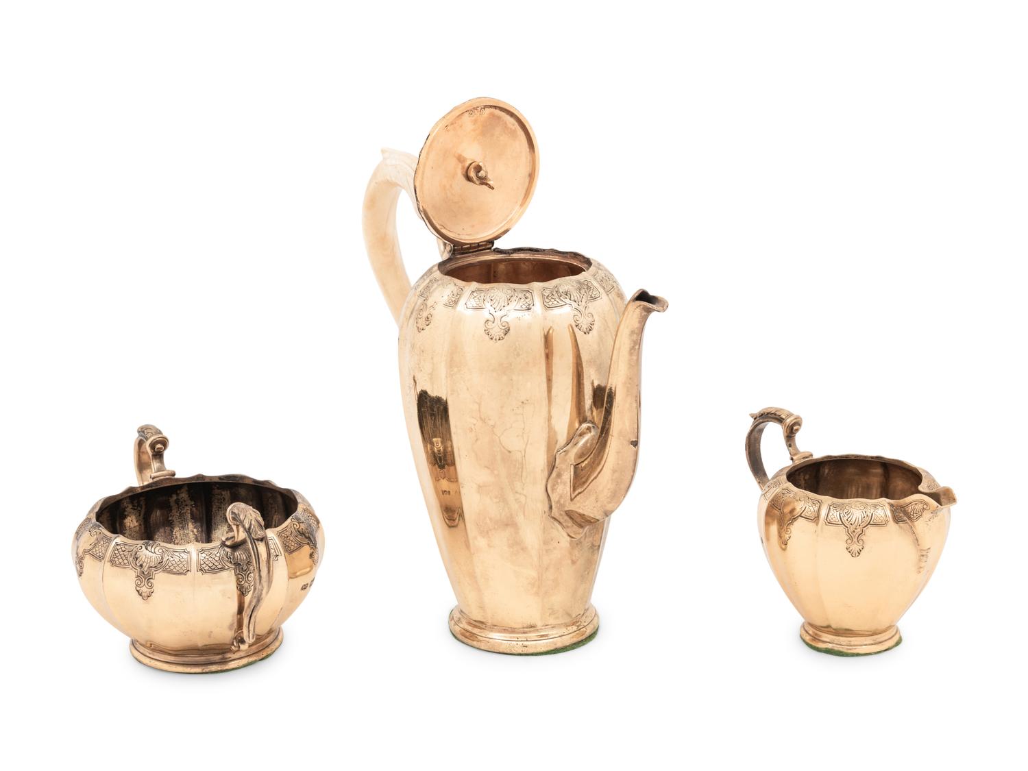 An English Silver-Gilt Four-Piece Coffee Service