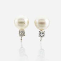 A cultured pearl, diamond, and platinum necklace with similar ear clips
