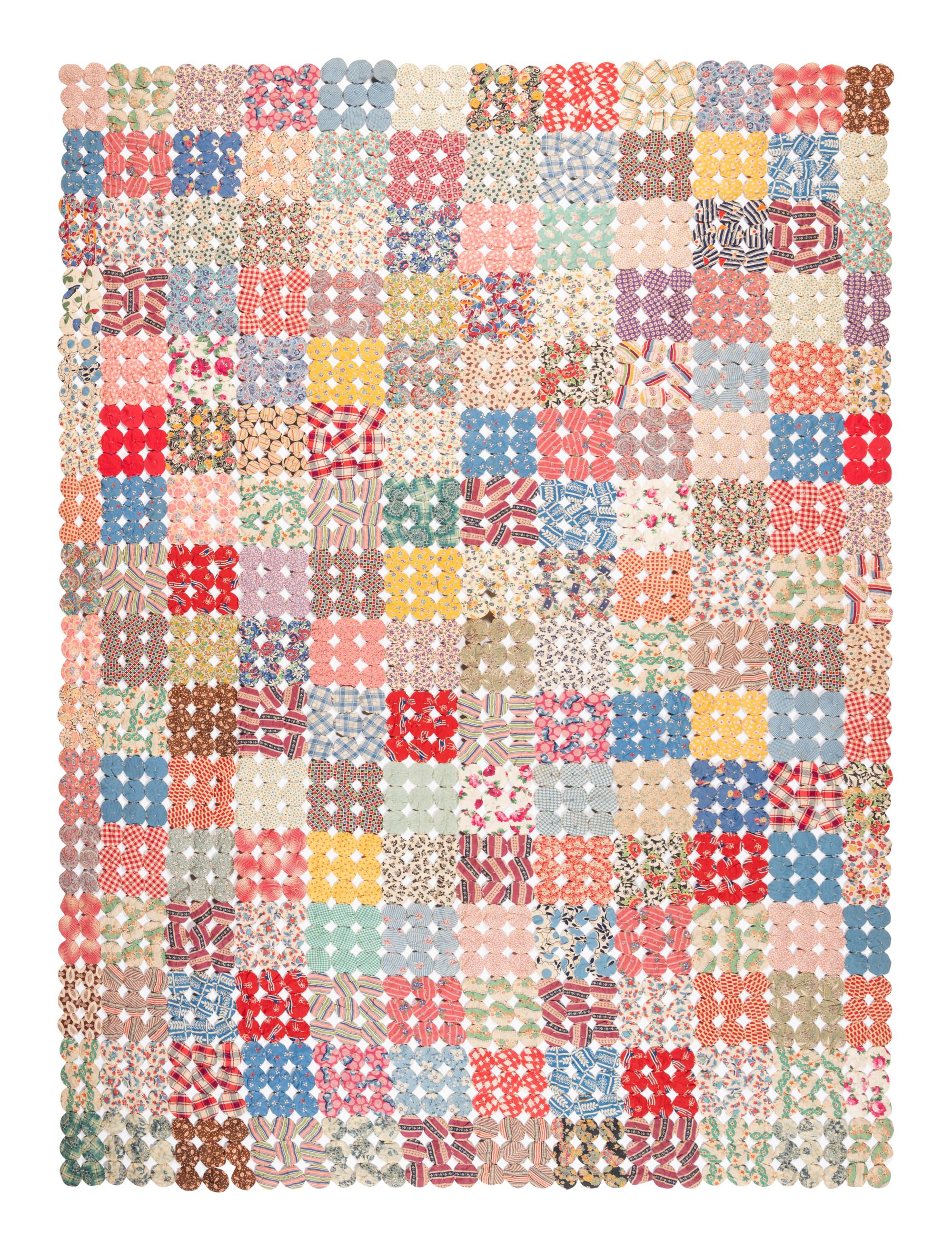 A Pieced Cotton Yo-Yo Quilt