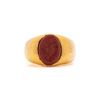 A Roman Gold and Red Jasper Finger Ring with a Male Portrait Head