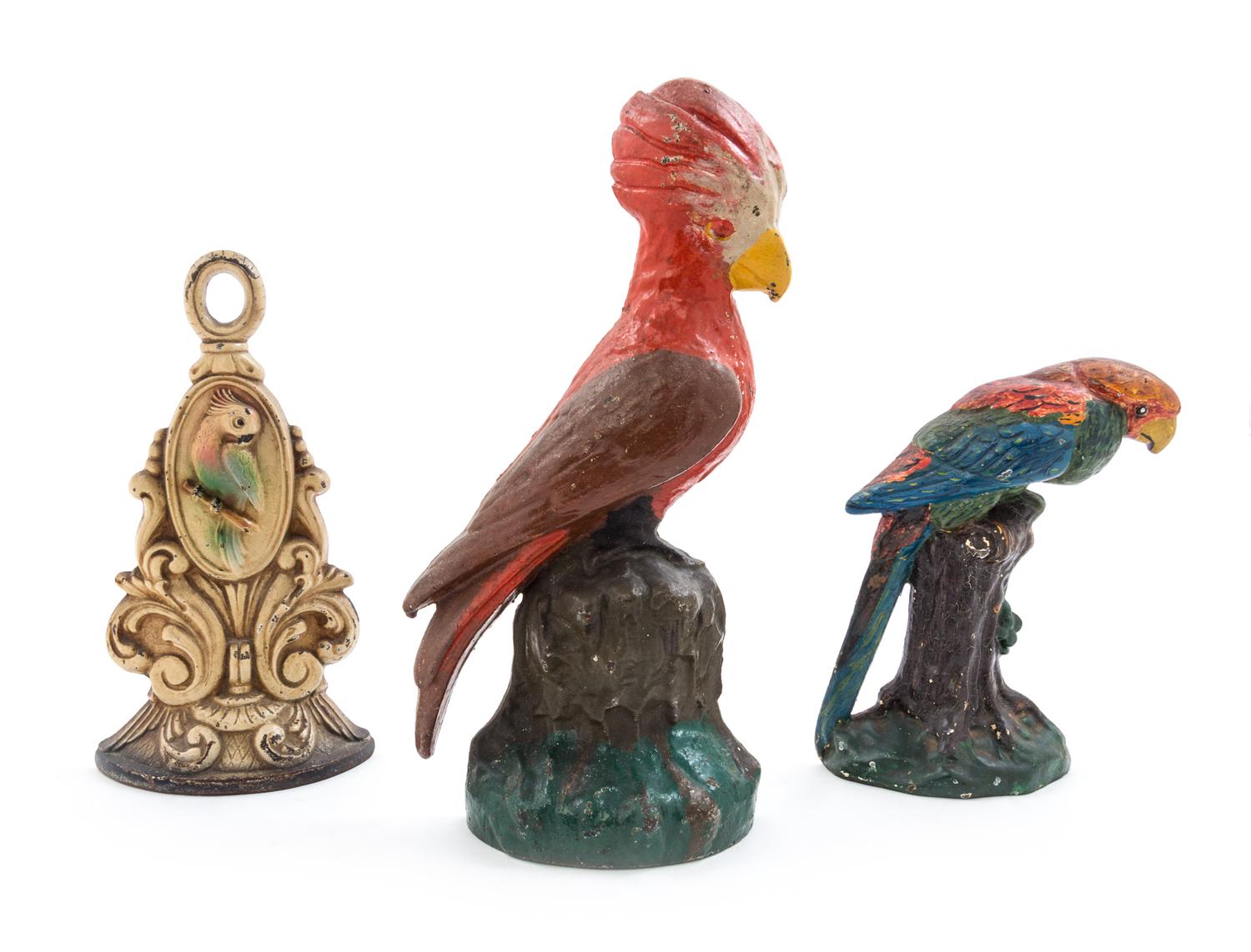 Three Victorian Cast Iron Doorstops Height of tallest 11 3/4 inches.