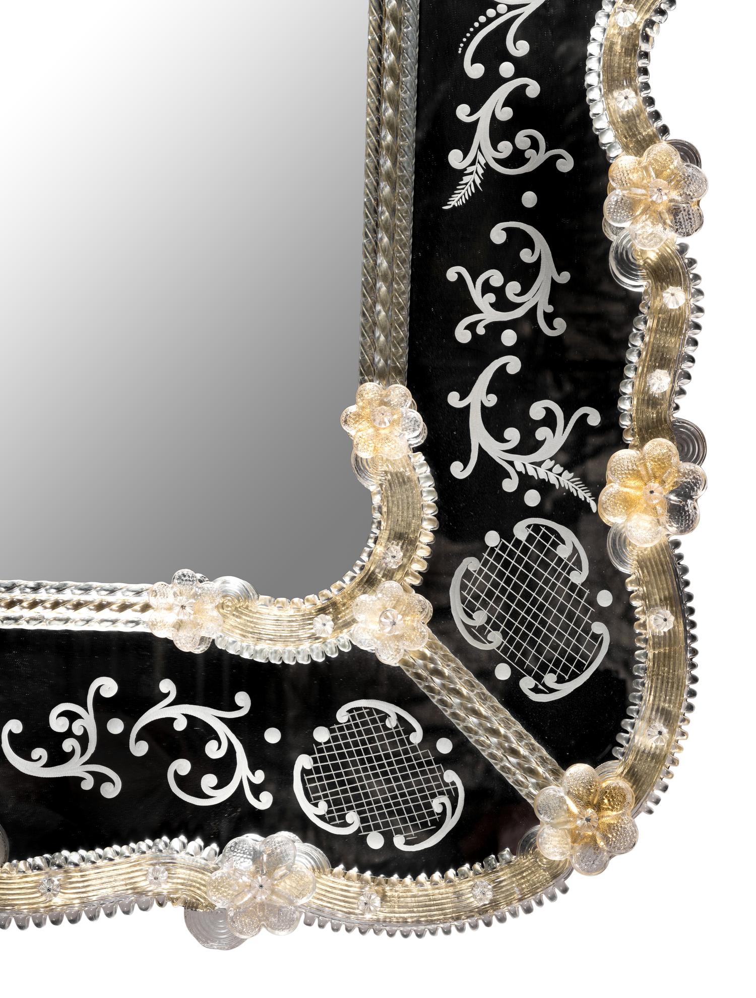 A Venetian Style Etched Glass Mirror