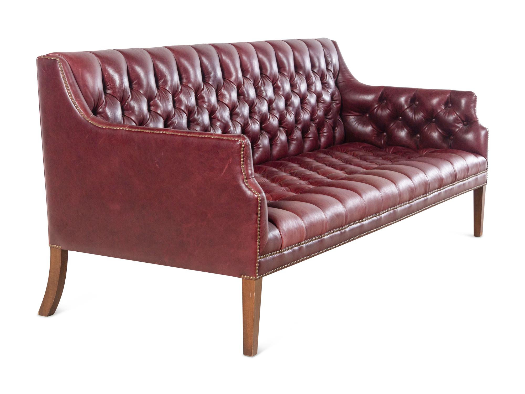 A Pair of English Button-Tufted Leather Sofas