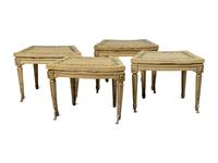 A Set of Four Louis XVI Cream and Polychrome Decorated Curved Window Benches