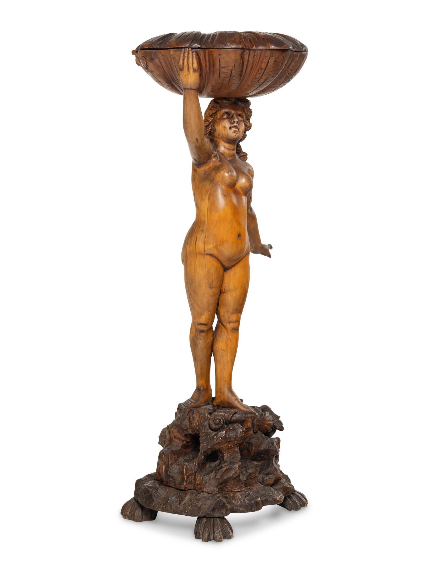 A Venetian Carved Walnut Figural Dressing Stand