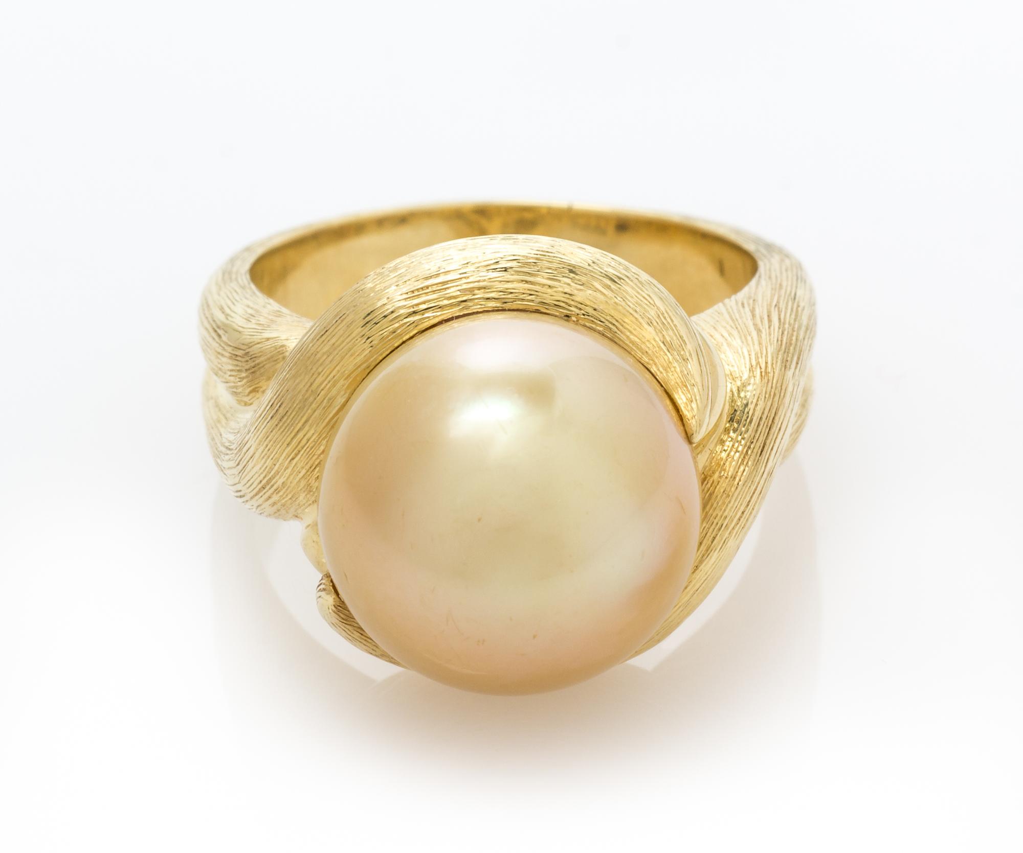 An 18 Karat Yellow Gold and Cultured Golden South Sea Pearl Ring, Henry Dunay, 11.90 dwts.