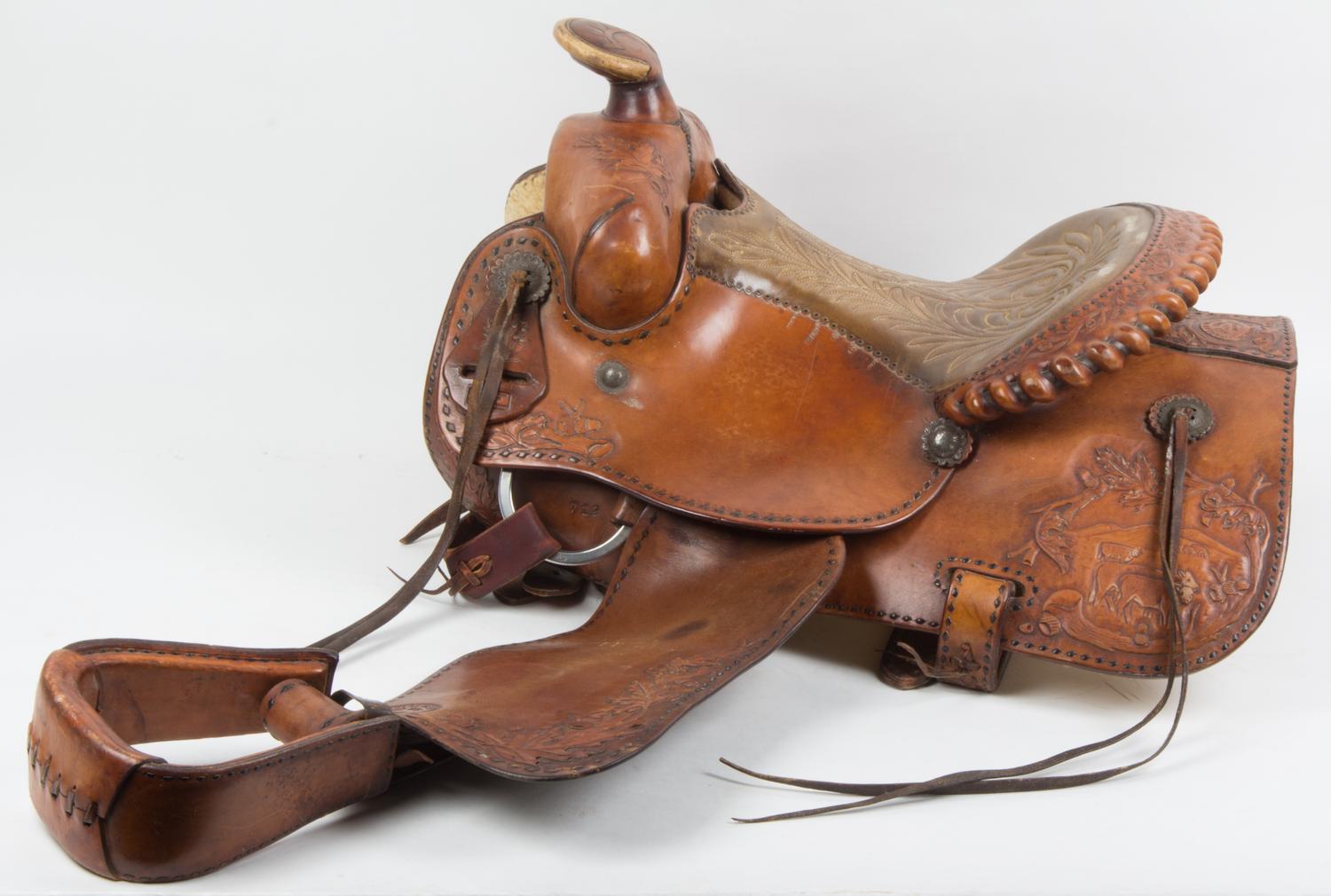 A Western Saddle Seat 12 3/4 inches.