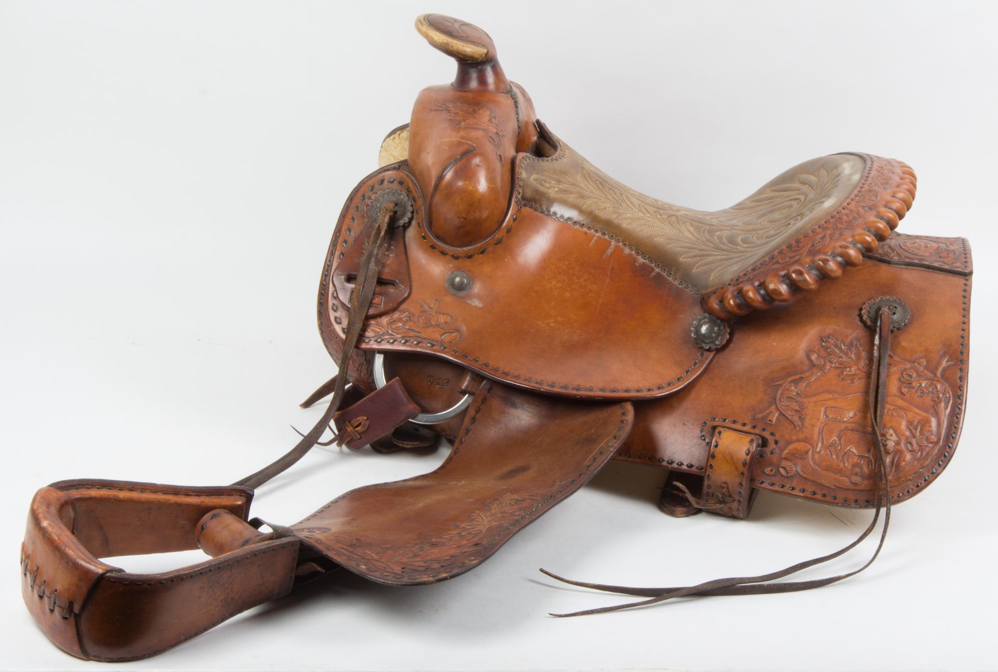 A Western Saddle Seat 12 3/4 inches.