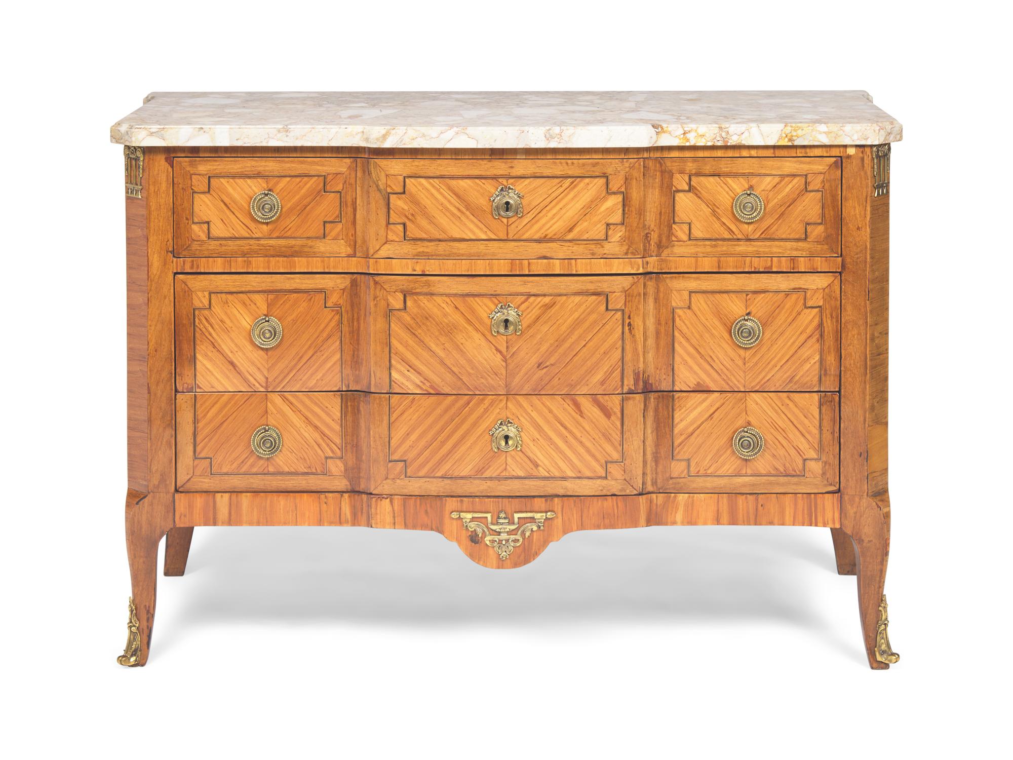 A Late Louis XV Tulipwood Parquetry and Gilt-Bronze Mounted Commode