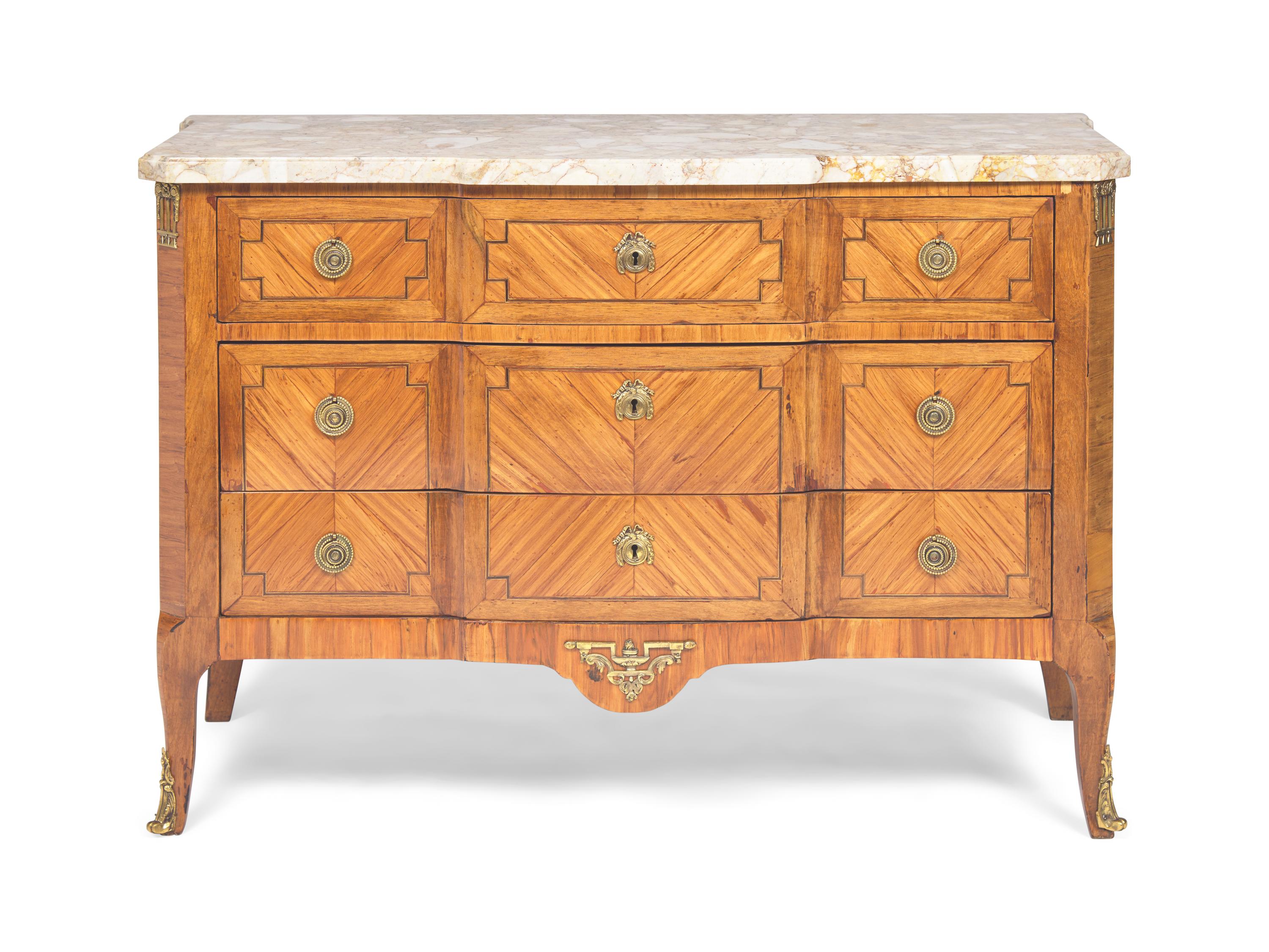 A Late Louis XV Tulipwood Parquetry and Gilt-Bronze Mounted Commode