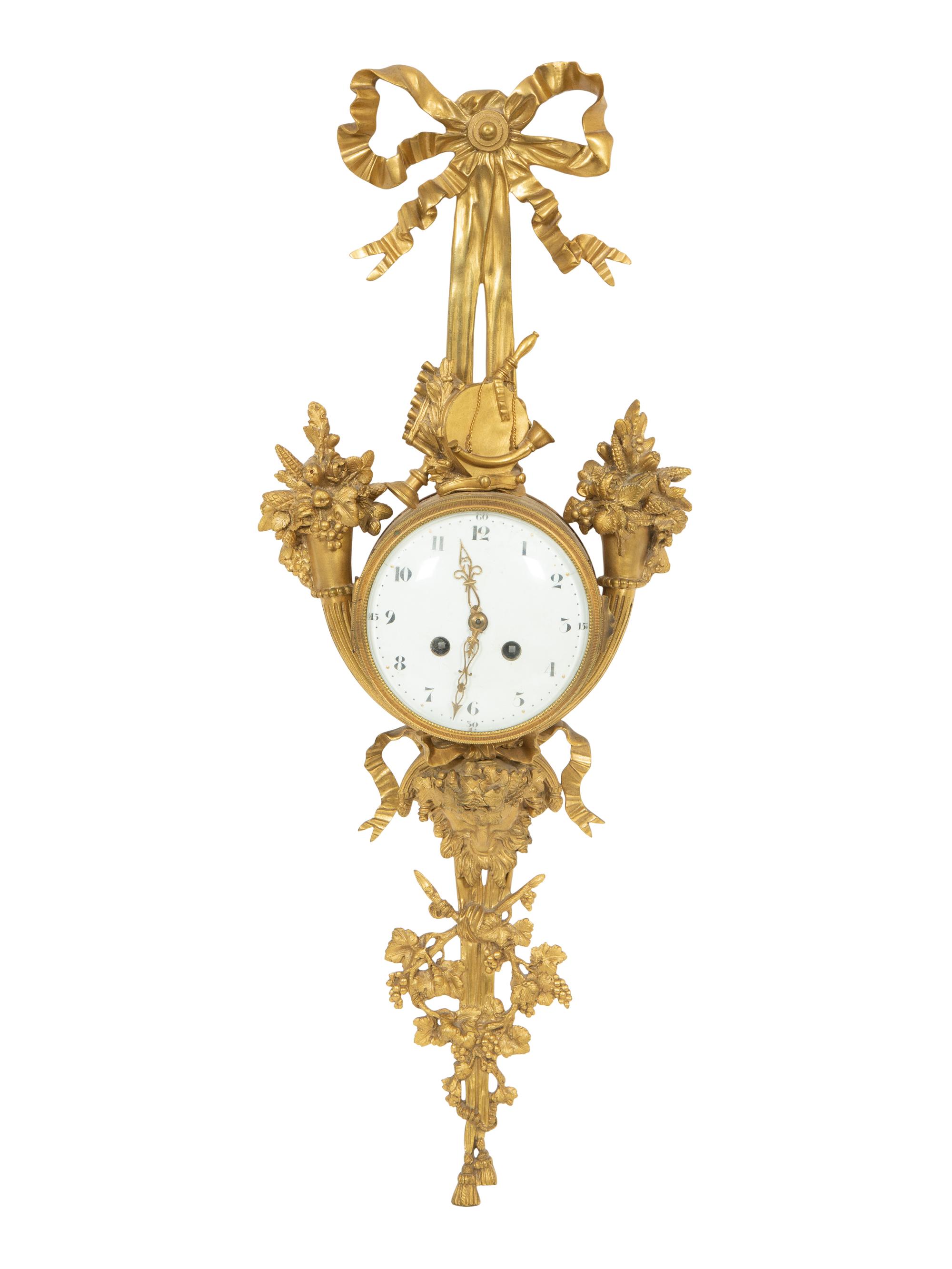 A Louis XVI Style Gilt Bronze Cartel Clock