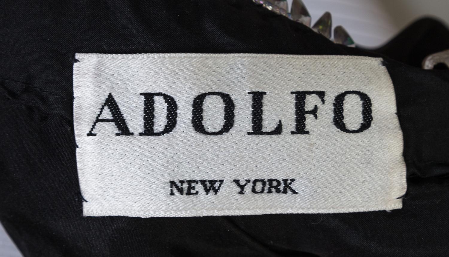 An Adolfo 1970s Black Chiffon One Shoulder Gown,