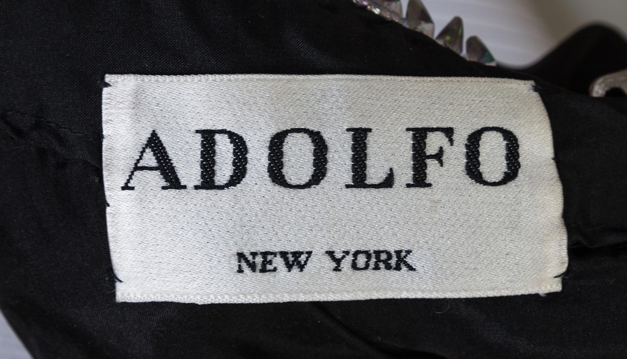 An Adolfo 1970s Black Chiffon One Shoulder Gown,