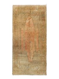 An Oushak Wool Rug — 20TH CENTURY