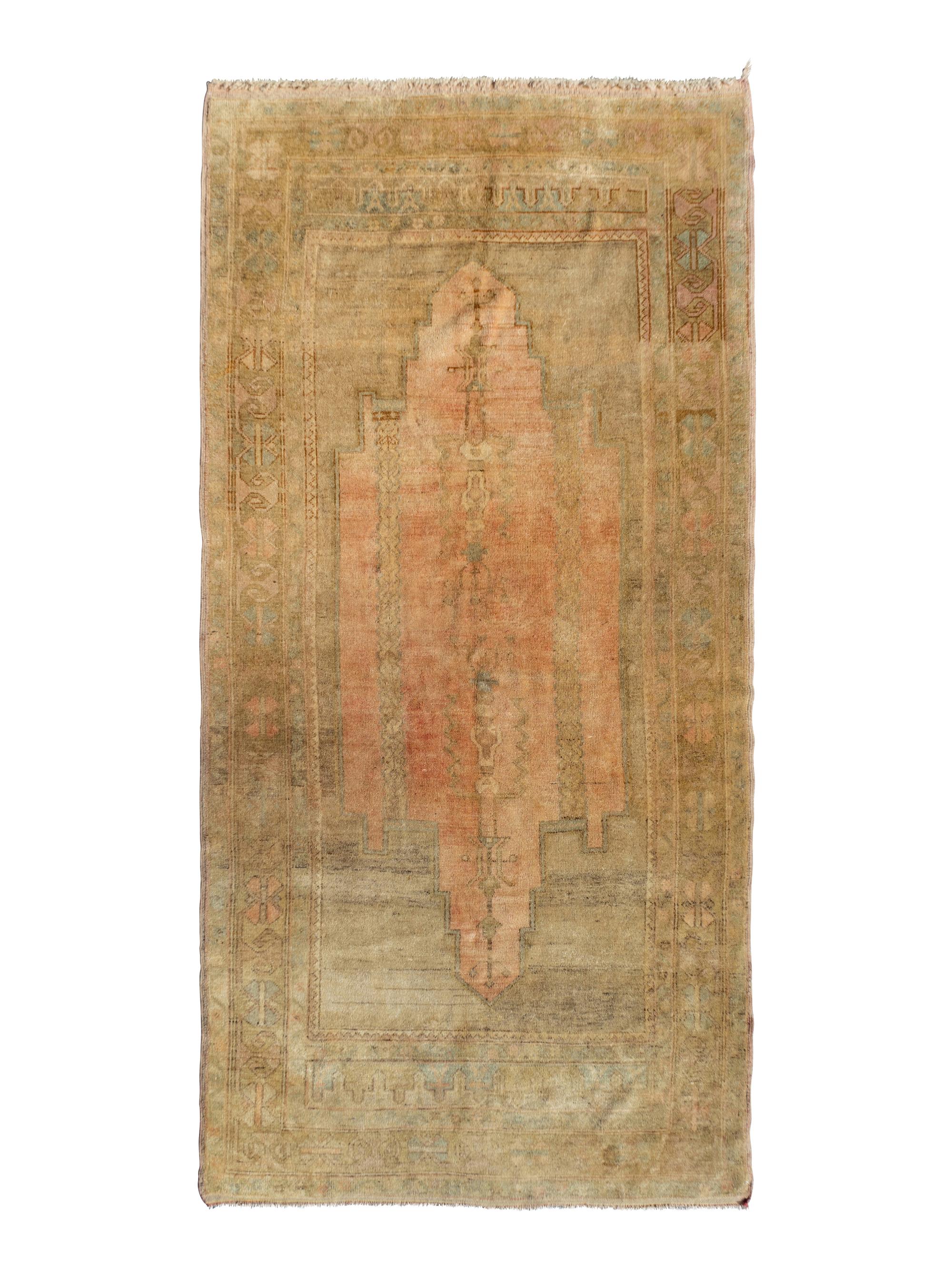 An Oushak Wool Rug — 20TH CENTURY