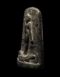 An Egyptian Black Stone Cippus of Horus