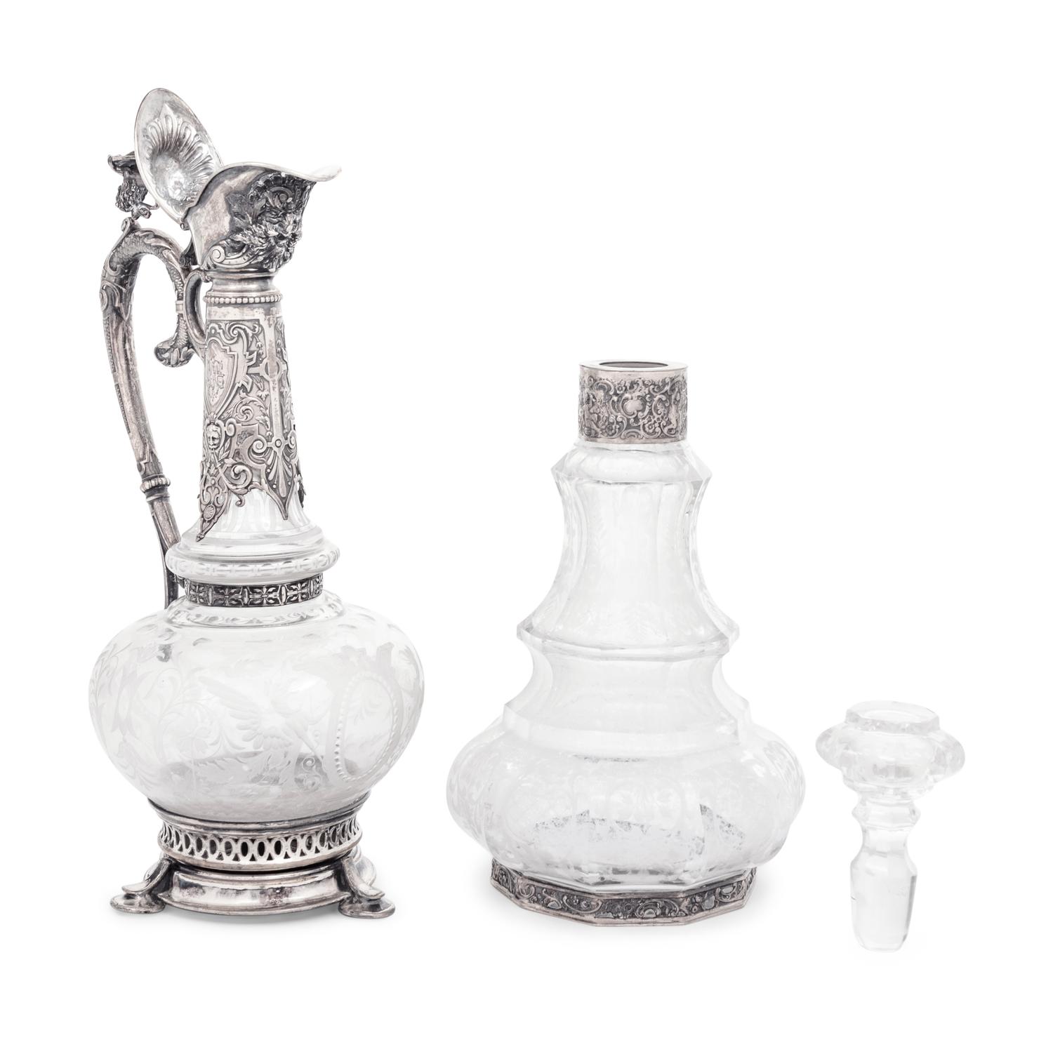 A Continental Silver Mounted Etched Glass Decanter and an English Silver-Plate Mounted Etched Glass Claret Jug