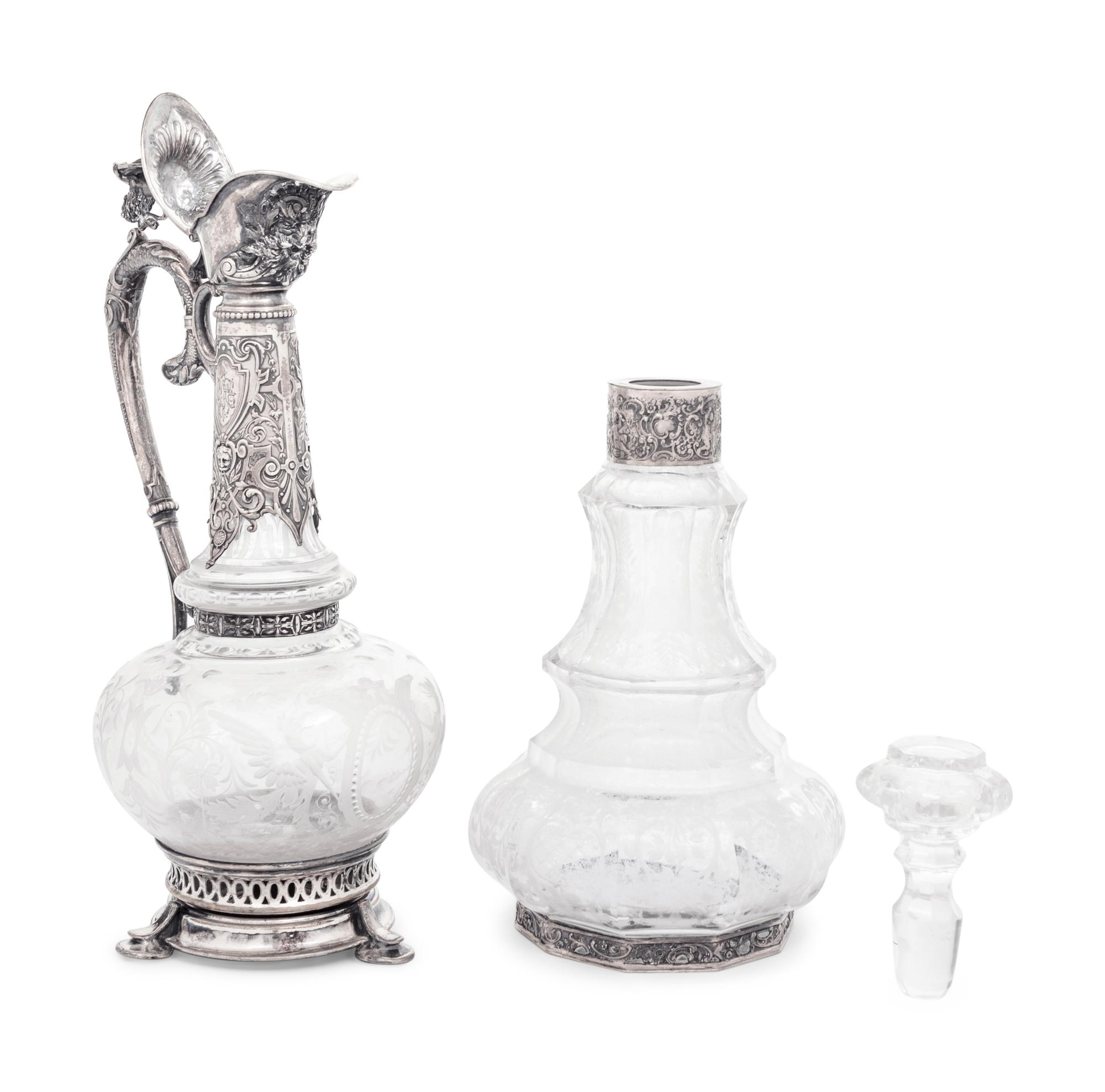 A Continental Silver Mounted Etched Glass Decanter and an English Silver-Plate Mounted Etched Glass Claret Jug