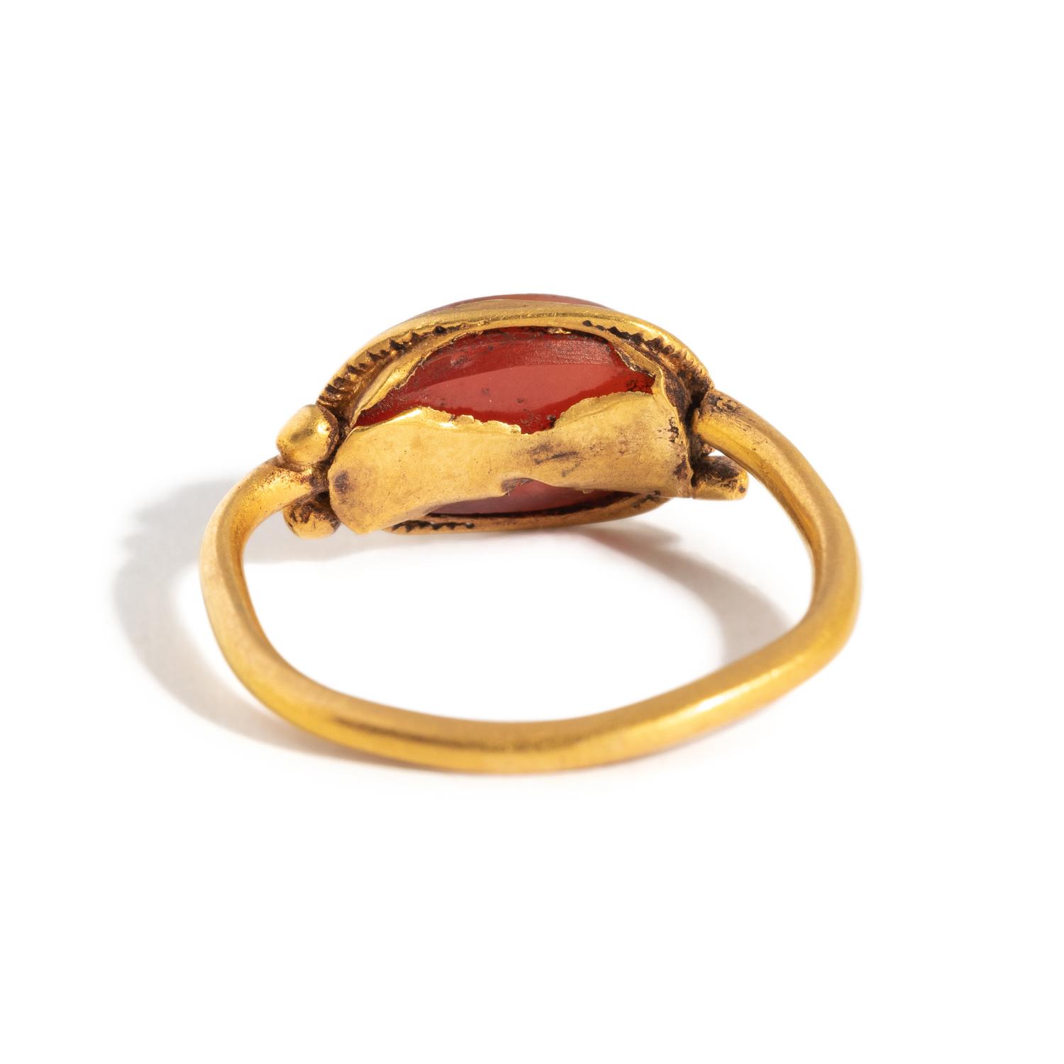 A Roman Gold and Carnelian Finger Ring with the Goddess Minerva