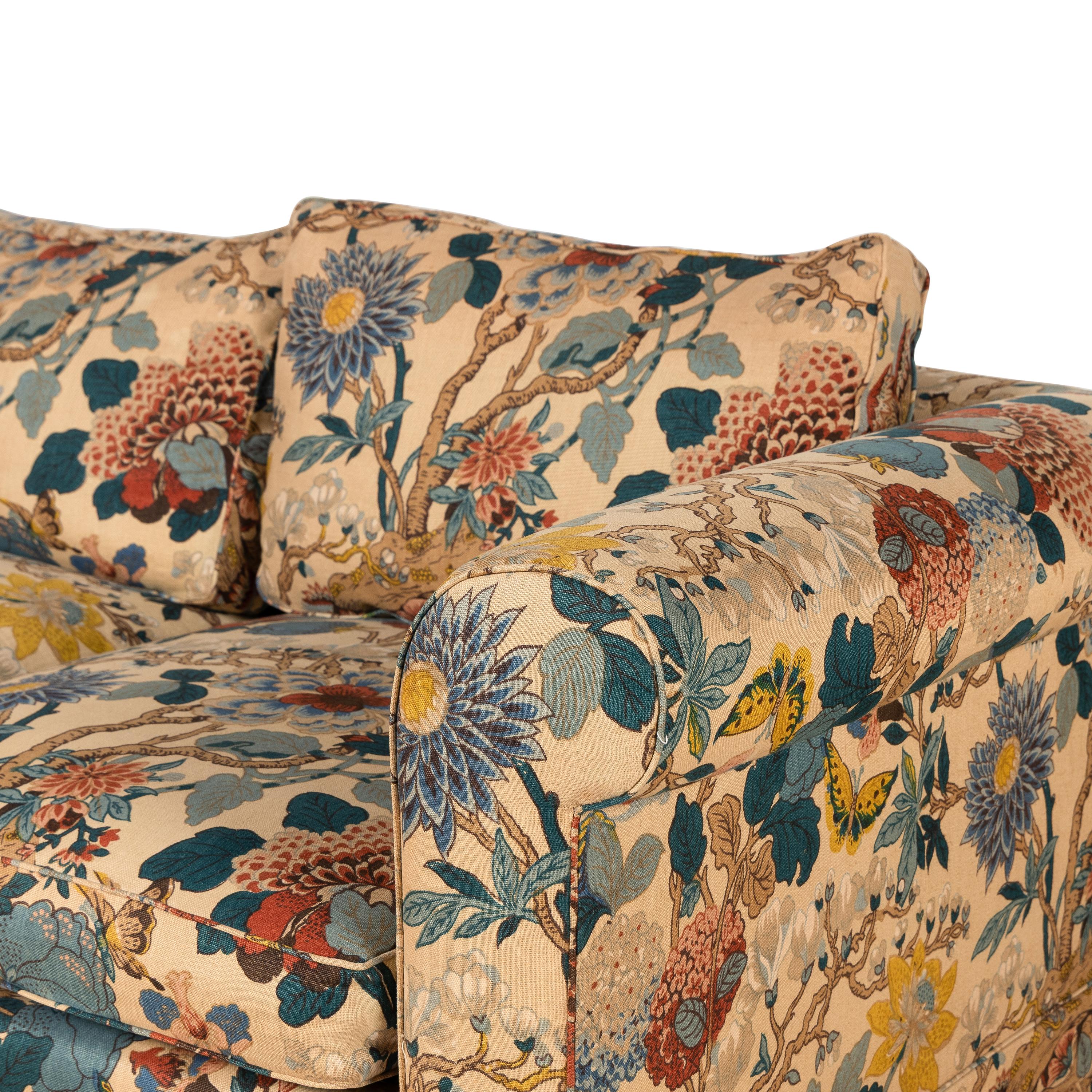 A Pair of Printed Cotton Upholstered Three-Cushion Sofas