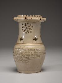 An Incised and Impressed Stoneware Puzzle Jug