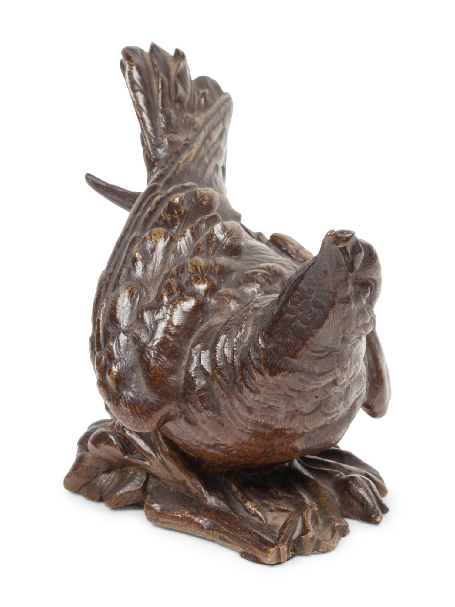 Two Sculptures: Winter Bird, edition 1/100, together with unmarked bird bronze