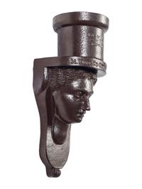 A Glazed Sewer Tile 'Liberty Head' Hanging Match Holder