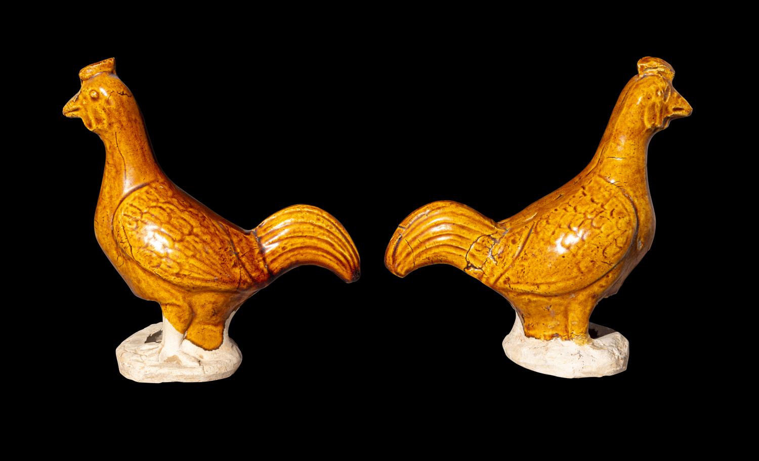 A Pair of Chinese Amber Glazed Pottery Figures of Standing Cockerels