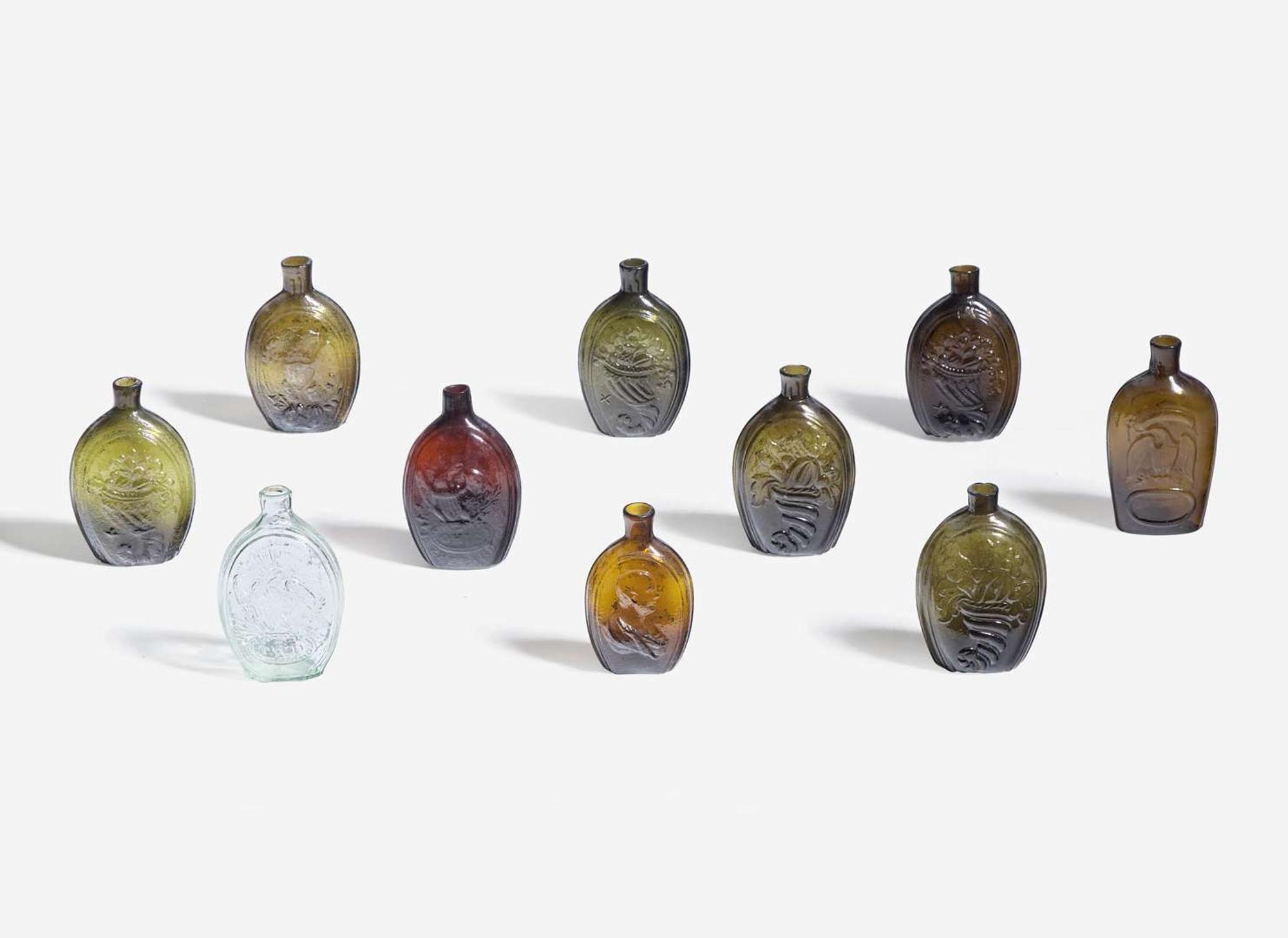A collection of ten mold-blown colored glass flasks, various makers, 19th century