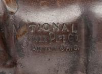 A Glazed Sewer Tile Advertising Pig