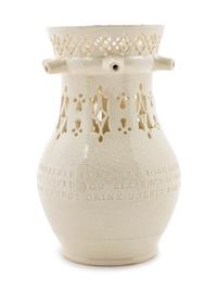 A Leeds Creamware Puzzle Jug