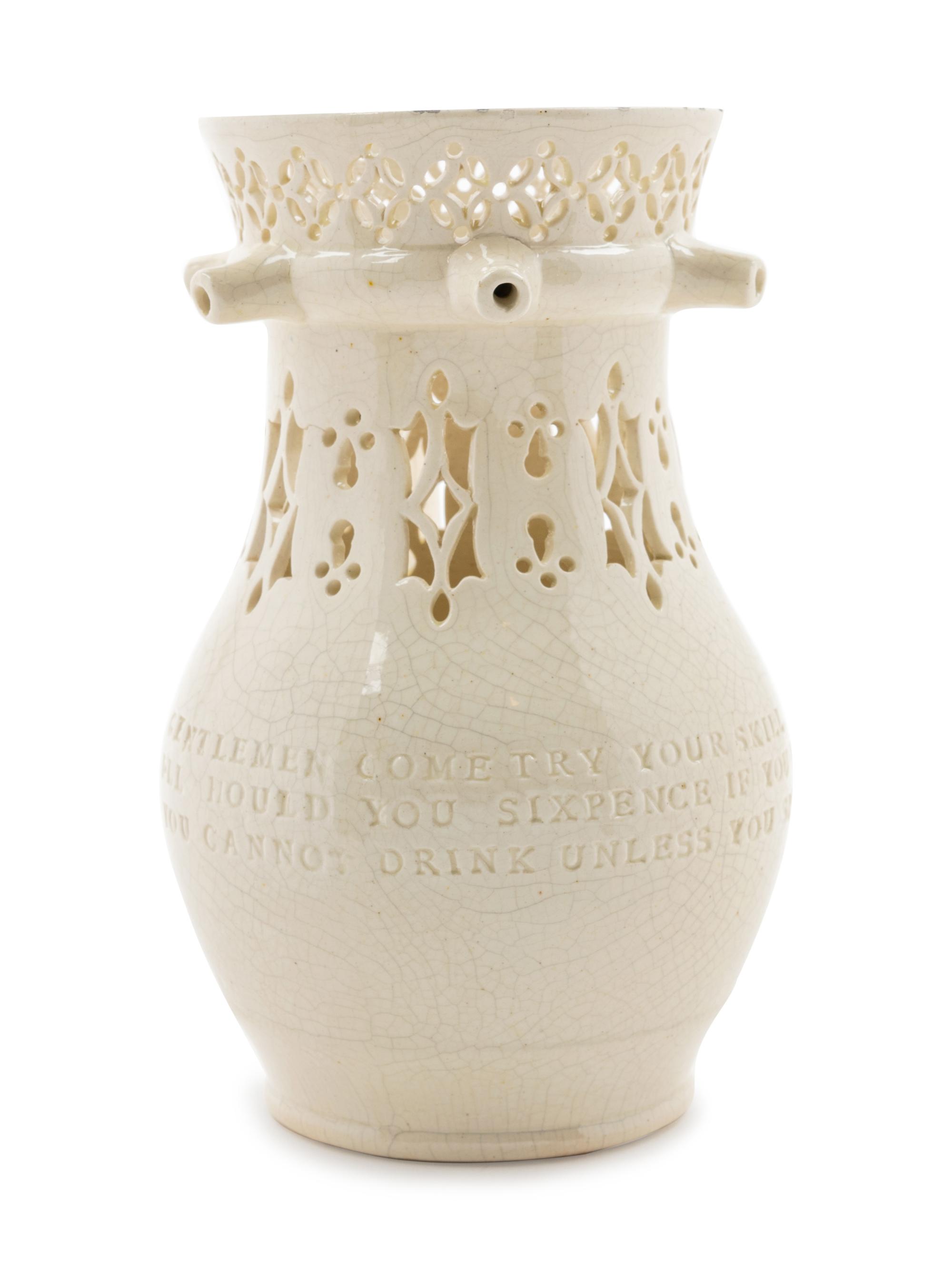 A Leeds Creamware Puzzle Jug