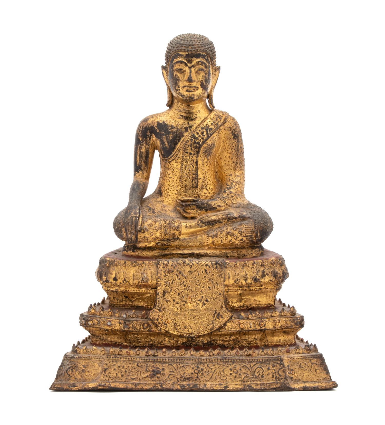 A Thai Gilt Bronze Figure of a Seated Buddha — LATE 19TH/EARLY 20TH CENTURY