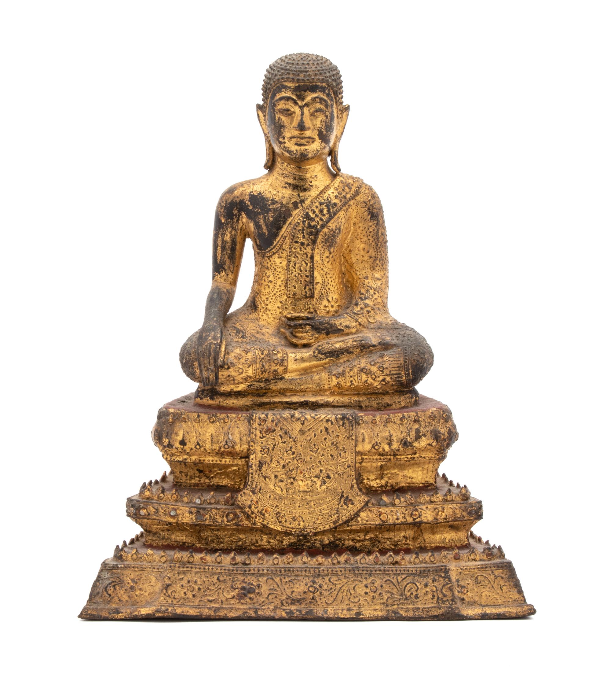 A Thai Gilt Bronze Figure of a Seated Buddha — LATE 19TH/EARLY 20TH CENTURY