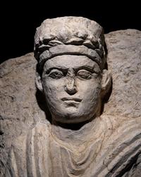 A Palmyrene Limestone Bust of a Priest