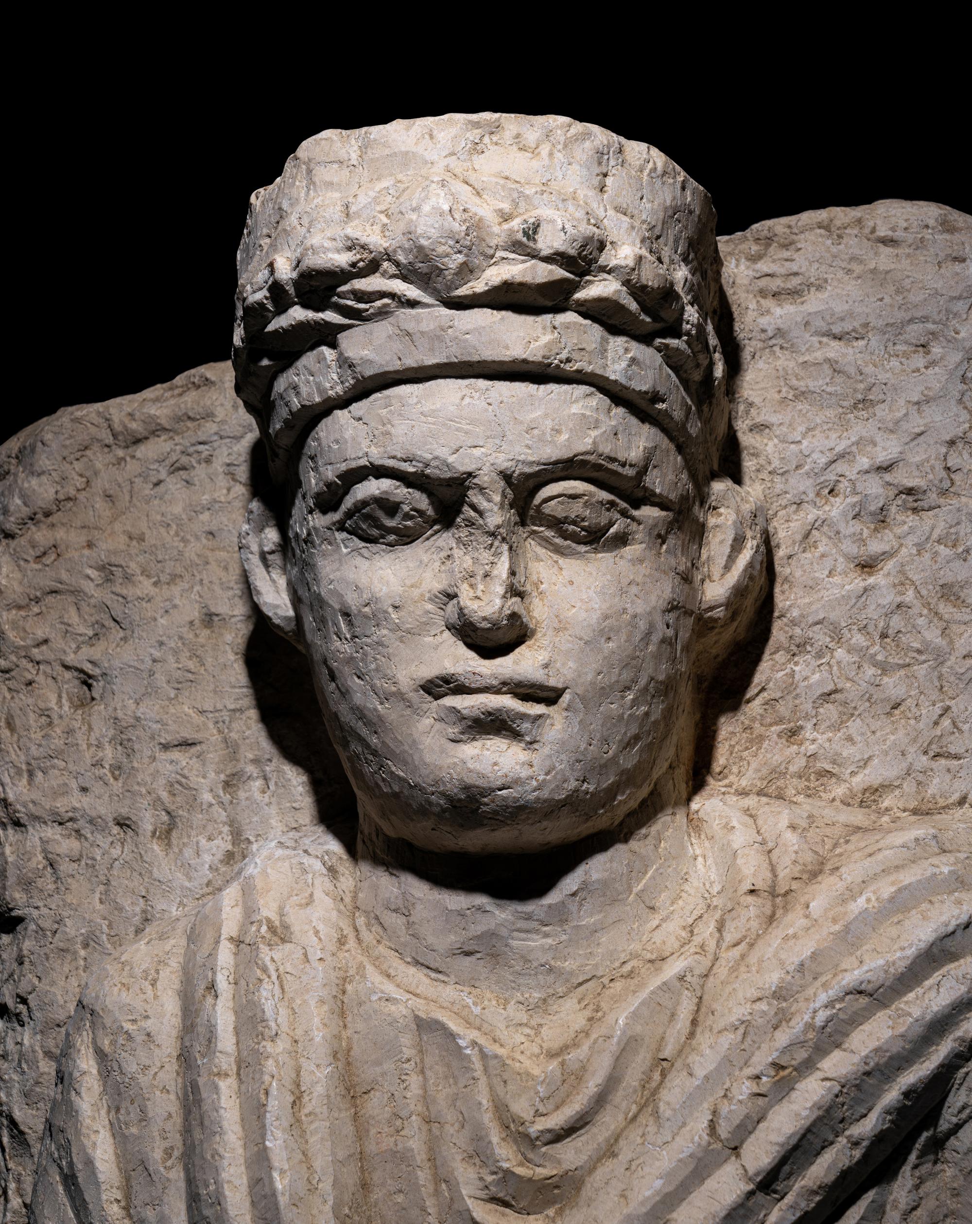 A Palmyrene Limestone Bust of a Priest