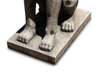 A Pair of Carved Granite and Black Marble Inlaid Seated Dogs
