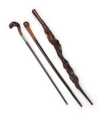 Three Carved Walnut Walking Sticks
