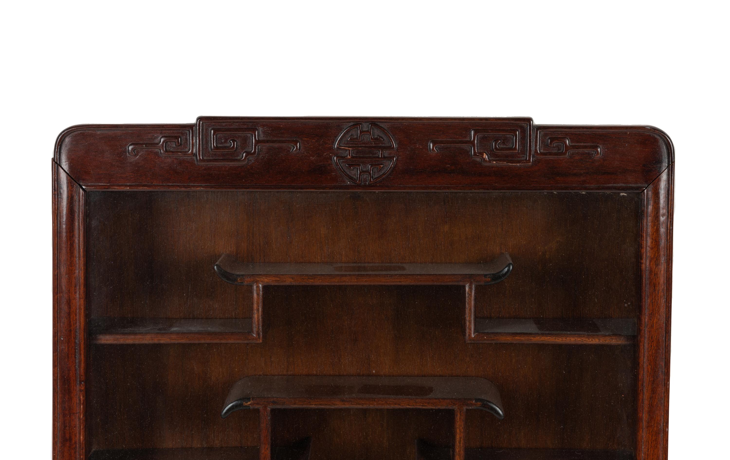 A Pair of Chinese Carved Hardwood Vitrine Cabinets