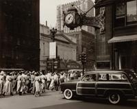 A group of four photographs depicting Chicago ( Rush Street, Chicago's Night Club District , c. 1950; Wrigley Building at Night, Michigan Ave. Bridge , c. 1950; Chicago , c. 1935; State Street and Marshall Field Clock , c. 1950)