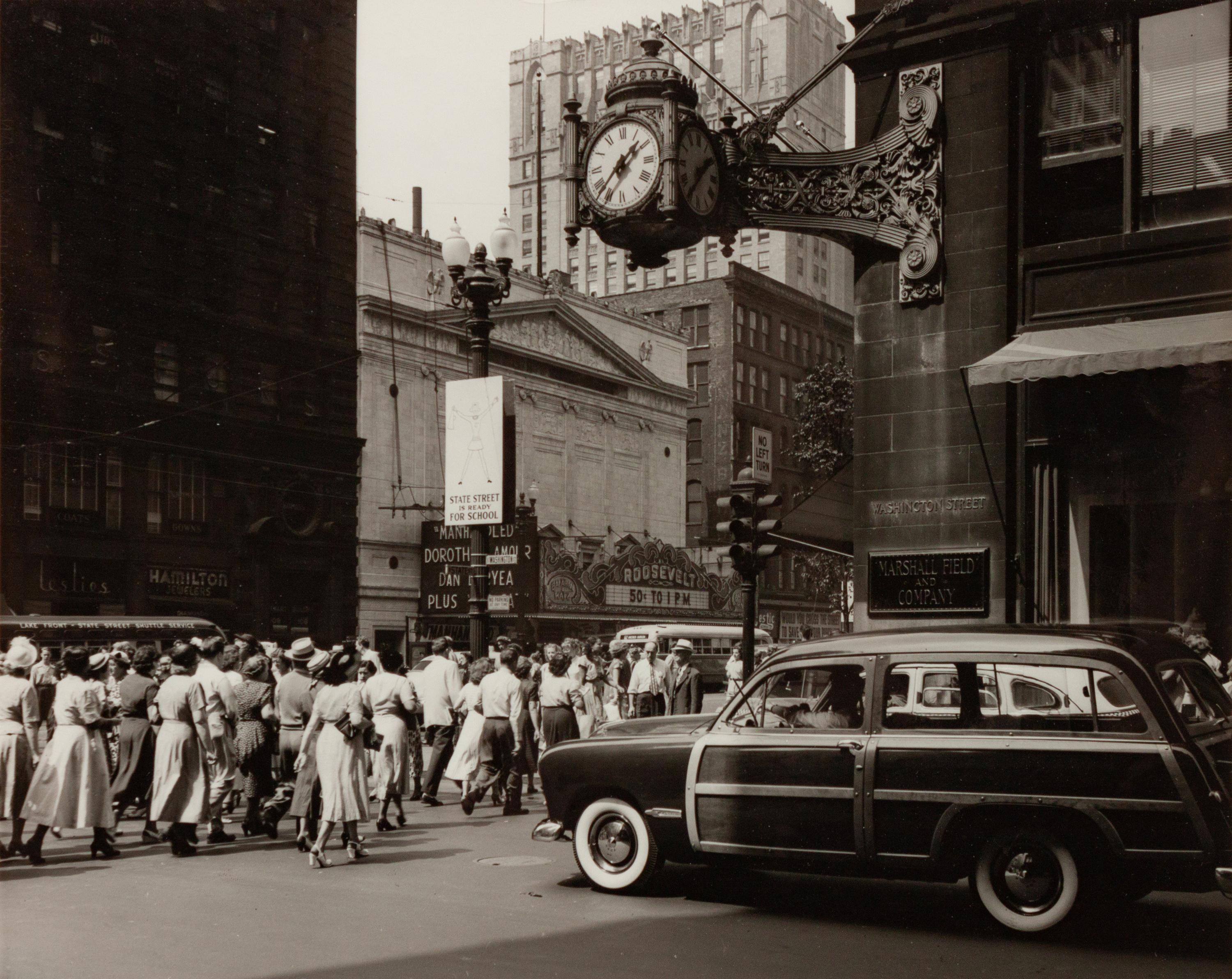 A group of four photographs depicting Chicago ( Rush Street, Chicago's Night Club District , c. 1950; Wrigley Building at Night, Michigan Ave. Bridge , c. 1950; Chicago , c. 1935; State Street and Marshall Field Clock , c. 1950)