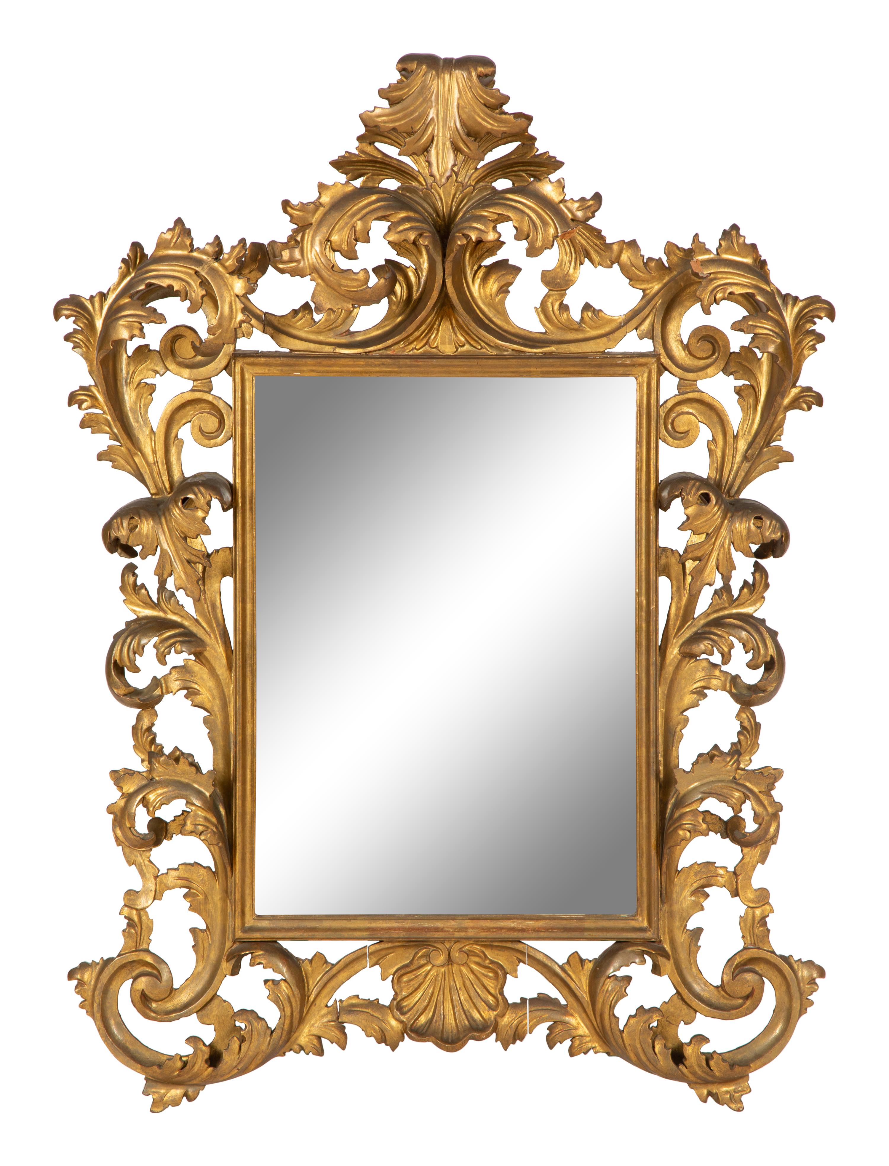 An Italian Rococo Style Giltwood Mirror