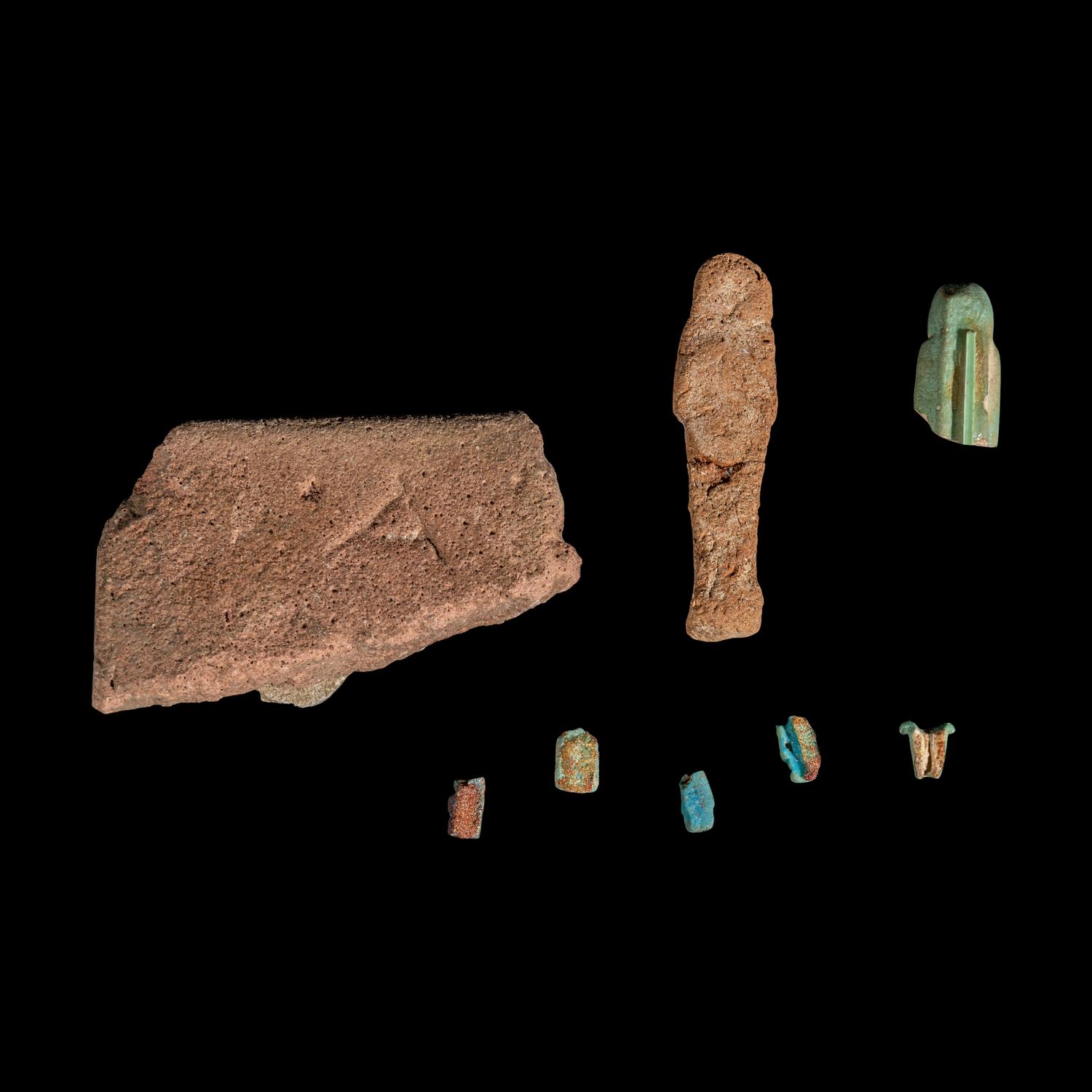 An Egyptian Granite Hedgehog — with 8 additional faience objects