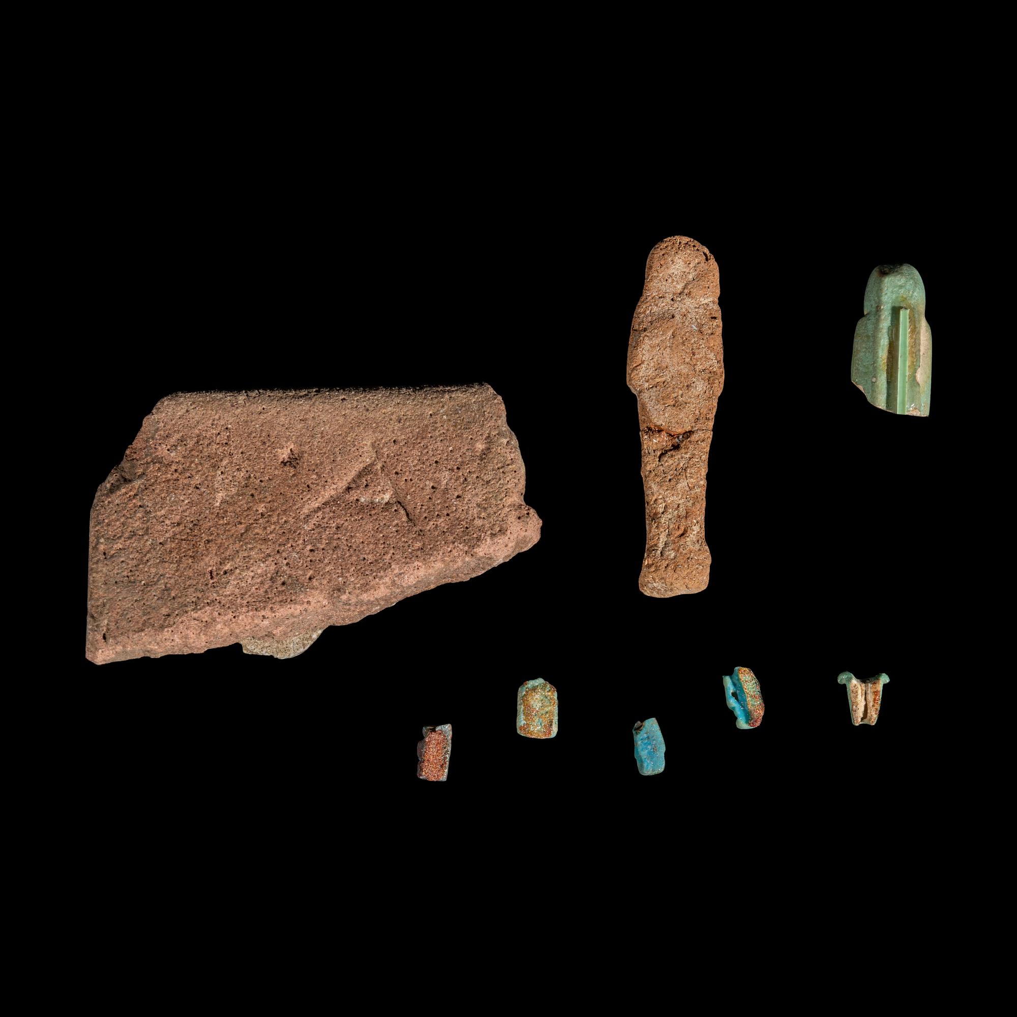 An Egyptian Granite Hedgehog — with 8 additional faience objects